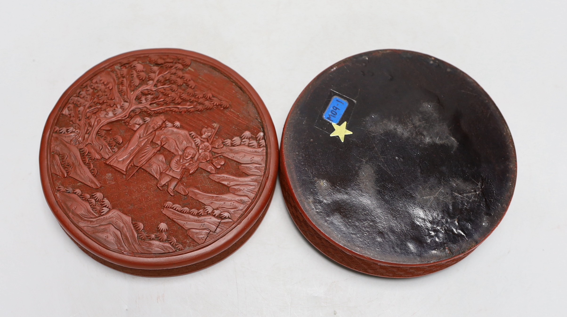A 19th century Chinese cinnabar lacquer box and cover, 13cm diameter